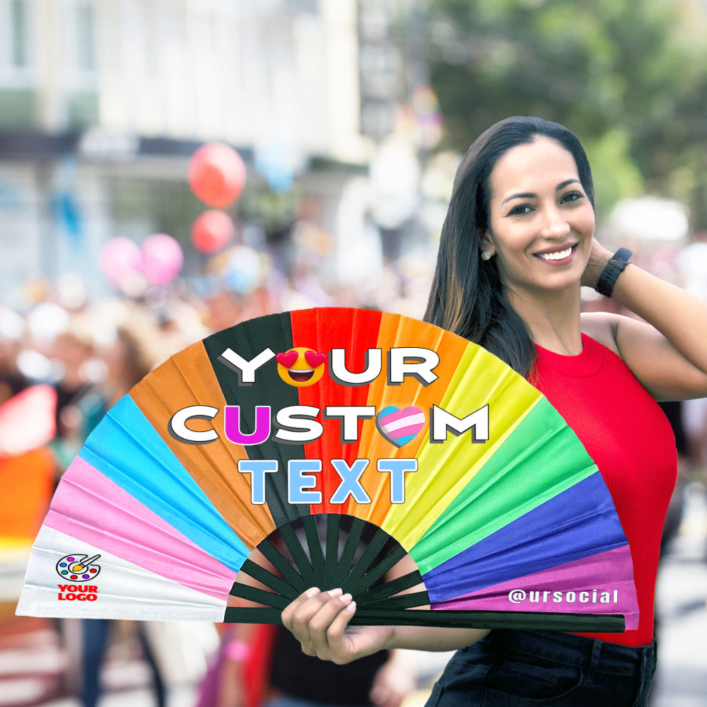 Pride Fans® female holding a large rainbow colored festival clack fan in a gay pride festival